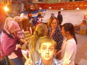 Sumner ready to stop shopping in the Muslim Bazaar, Urumqi.